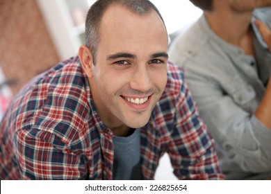 Smiling Guy In Shared Apartment With Roommates