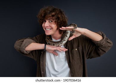 Smiling Guy Stand Brave With Snake On Him, Caucasian Male Doesn't Afraid Of Animals