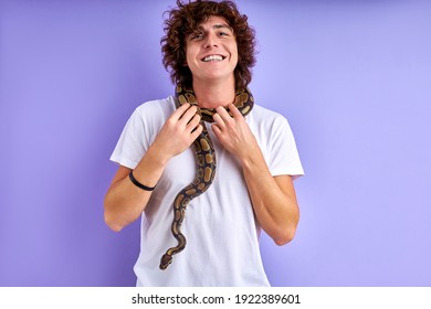 Smiling Guy Stand Brave With Snake On Him, Caucasian Male Doesn't Afraid Of Animals