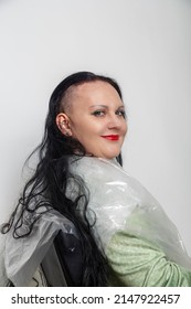 Smiling With Half Shaved Head Brunette Woman With Bright Makeup In Barber Chair. Vertical Photo