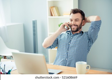 Smiling handsome businessman having talk with his clients - Powered by Shutterstock