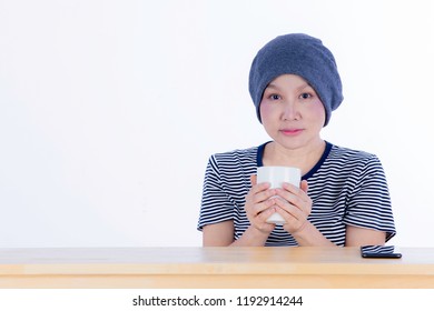 Smiling Happy Cancer Woman In Chemotherapy Period No Hair Working At Home With Technology, Laptop, Smartphone On Isolated Background