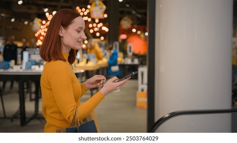 Smiling happy Caucasian woman female girl businesswoman shopper buyer customer client answering mobile phone smartphone call talking tell sales discount enjoy shopping rides escalator indoor shop mall - Powered by Shutterstock