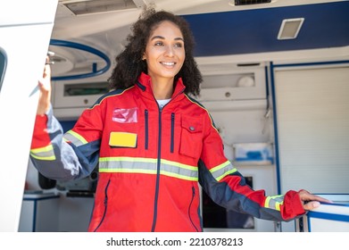 Smiling Happy Healthcare Worker In The EMS Vehicle