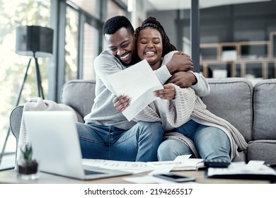 Smiling, Happy And Hugging Couple Enjoying, Embracing And Loving Remote Work Together At Home. Young Romantic Partners Working Online And Celebrating Successful News Or Job Success Letter On A Sofa