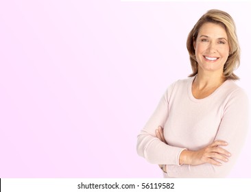 Smiling Happy Mature Woman. Over Pink Background