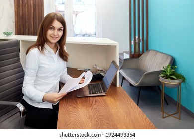 Smiling Happy Woman Workingt At Reception In A Hospital, Girl At The Reception In The Office, Administration