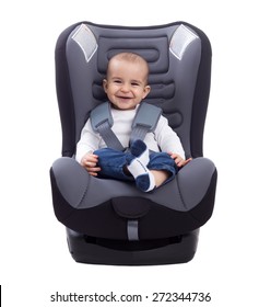 Smiling Infant Baby Child Sitting In A Car Seat, Isolated On White