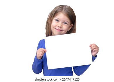 Smiling Kid Holding Empty Sheet Of Paper As Mock Up On White Background Caucasian Little Girl Of 5 Years In Blue Waist Up