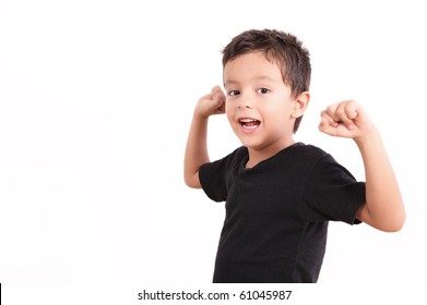 Smiling Kid Looking At The Camera Over White Background