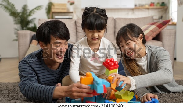 Smiling Korean Family Three Having Fun Stock Photo 2141082401 ...