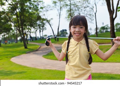 Smiling little girl at golf course