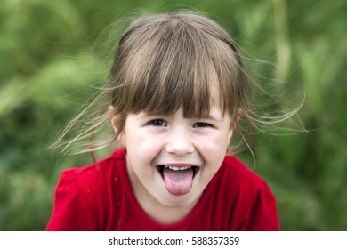 Smiling Little Girl Shows Tongue Young Stock Photo 588357359 | Shutterstock