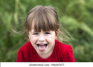 Smiling Little Girl Shows Tongue Young Stock Photo 588357359 | Shutterstock