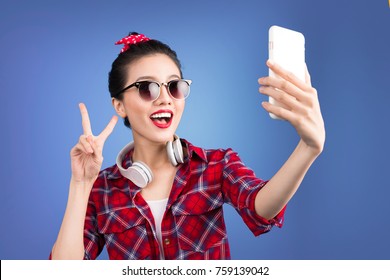 Smiling Lovely Active Asian Girl Taking Selfie Photo.