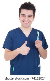 Smiling Male Dentist Holding Toothbrush And Showing Thumb Up Isolated On White Background