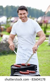 Smiling Man With A Barbecue