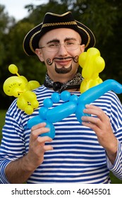 smiling man with drawed beard and whiskers in pirate suit with three air-balloons