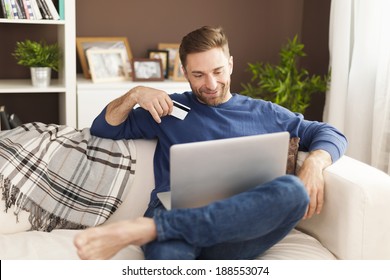 Smiling Man During Online Shopping At Home