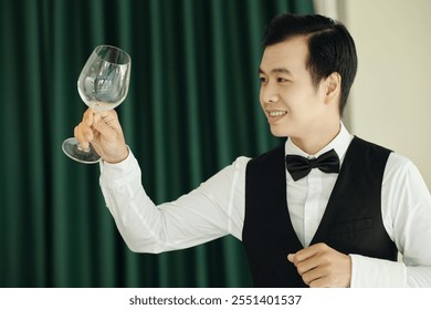 Smiling Man Holding Glass of Wine in Formal Attire - Powered by Shutterstock