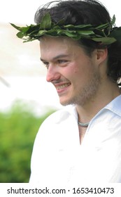 Smiling Man With A Laurel Wreath On His Head