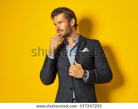 Smiling man on yellow background