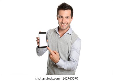 Smiling man pointing at smartphone screen