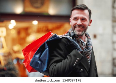 Smiling Man With Shopping Bags 