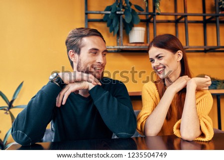 Similar – Image, Stock Photo Side view of loving couple looking at each other