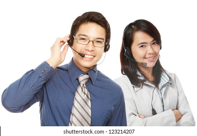 A smiling man and woman wearing headsets