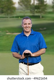 Smiling Mature Golfer on golf course
