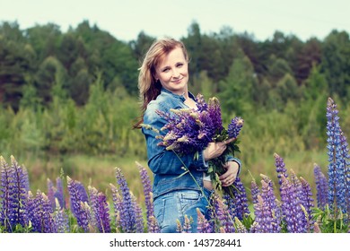 	Smiling Mature Woman And Flowers