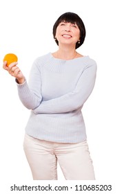 Smiling Mature Woman Holding An Orange In Hand