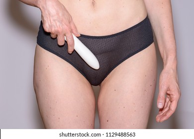 Mature woman showing white thong