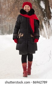 Smiling Mature Woman Is Walking At Winter Park