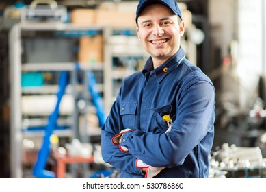 Smiling mechanic portrait