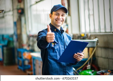 Smiling Mechanic Thumbs Up