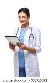 Smiling Medical Doctor Holding A Tablet Isolated On White