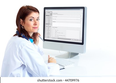 Smiling Medical Doctor Woman With Computer. Isolated Over White Background