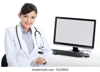 Smiling Medical Doctor Woman With Computer. Isolated Over White Background