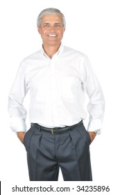 Smiling Middle Aged  Businessman With Hands In Pockets No Tie Sleeves Rolled Up Isolated On White