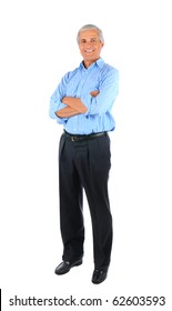 Smiling Middle Aged Businessman Standing With His Arms Folded. Business Man Is In Full  Length Over A White Background.