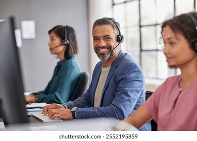 Smiling middle eastern customer support team working with headsets in a modern office. Portrait of indian mid adult call center agent providing excellent service. - Powered by Shutterstock - Get 15% off with code: PIKWIZARD15