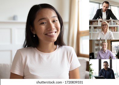 Smiling Millennial Asian Female Employee Have Online Webcam Conference With Diverse Colleagues, Multiracial Coworkers Engaged In Web Work Team Briefing, Talk On Video Call On Computer