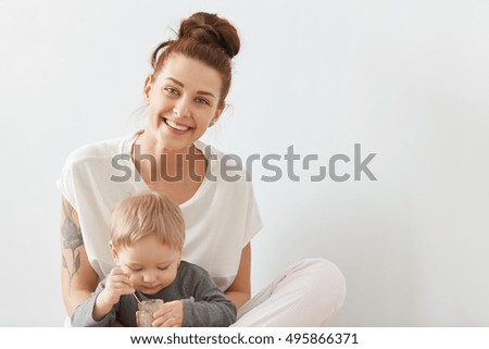 Similar – Image, Stock Photo mom Nutrition Lifestyle