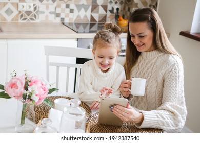 Smiling Mother Takes Selfie With Cute Daughter On Tablet, Happy Young Mom Laughing Makes Photo With Daughter At Home, Single Mom And Adopted Children Playing Fun With Phone