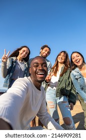 Smiling Multiracial Friends Take Selfie Looking At Camera. Copy Space. Vertical Image.