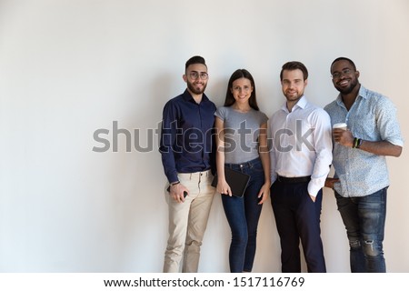 Similar – Image, Stock Photo Four people standing in a row on a ridge (2/2)