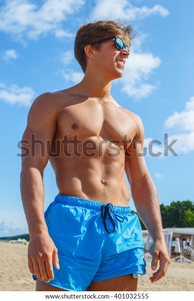 Smiling Muscular Guy Sunglasses Blue Shorts Stock Photo 401032555 ...