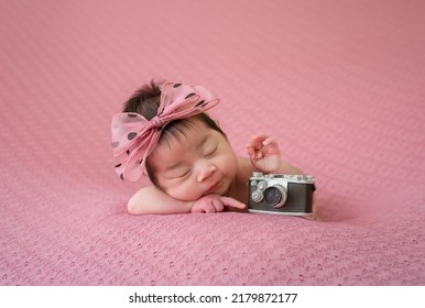 Smiling Newborn Baby With Mohawk Hair Sleeping